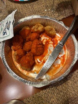 So I ordered the wings and they were barely tossed in the sauce at all, and they're basically chicken nuggets, not even boneless wings .