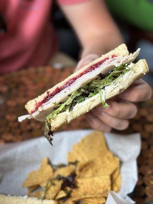 Turkey sandwich  with cranberry jam & corn chips