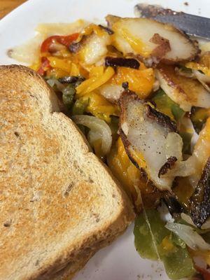 Home fries with peppers, onions, and cheese