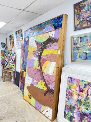 Vibrant oil paintings and collage pieces sure to brighten up any room.