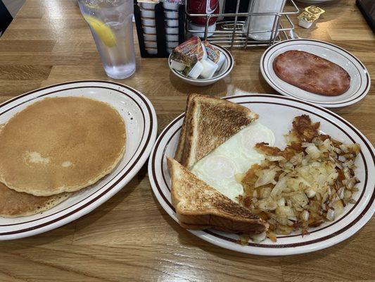 Delicious, perfectly cooked over medium and crispy home fries with onions, yum!