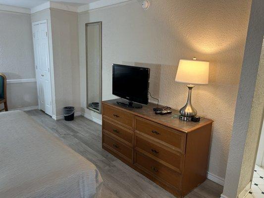 TV with cable and drawers.