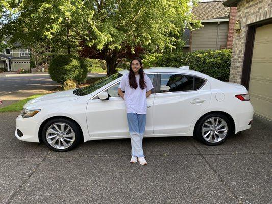 Happy driver of car new to her