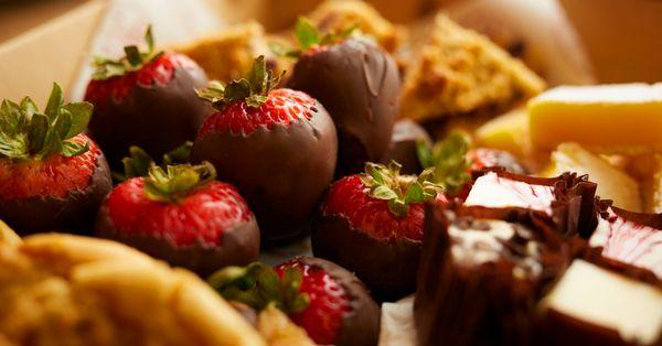 Executive Sweets-cookies, brownies, peanut butter yummy bars, assorted
  dessert bars, chocolate-dipped strawberries and cheesecake bites.