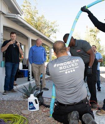 Inserting our pipe lining through an existing cleanout in the yard - no damage to the property!