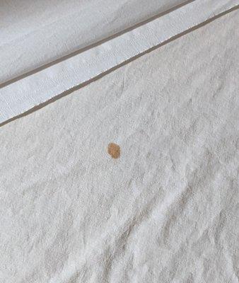 Stain on one of the bed's sheet