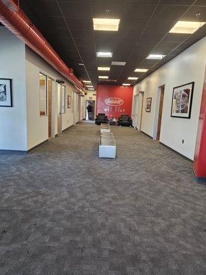 Hallway to the offices with the driver's lounge to the left