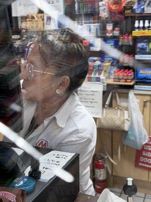 Employee who refused to give me her name and chased me out the store and threatened to run me over