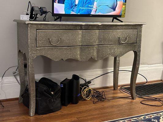 Bombay style console table--embellished tin. Not all the way decorated, but already the star.