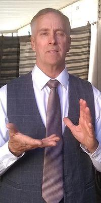 This is me trying on a new vest in my backyard. I didn't feel comfortable wearing it.