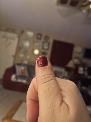 The nail that the shellac has come off.