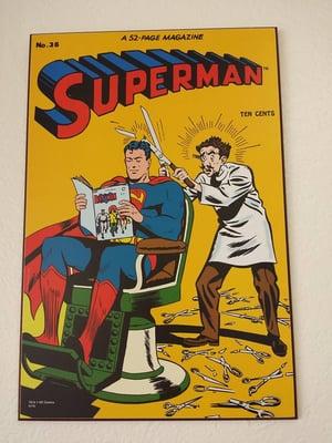 Superman getting a haircut