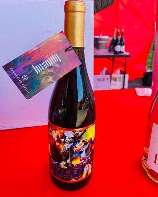 A gorgeous bottle of Felícita Zin with an Allison Torneros live artwork label