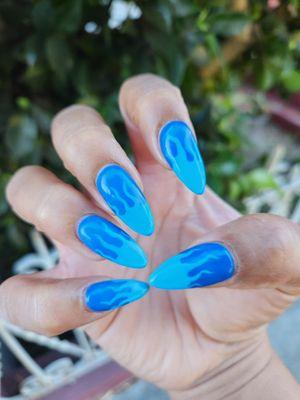 Not as happy with the work on the right. She tried but stuck to simple designs.