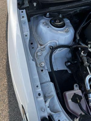 This is removed and not put back in, just close the lid, sloppy work