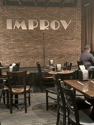 Inside in front of the stage