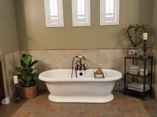 Rearrange bathroom and add stand alone soaking tub.