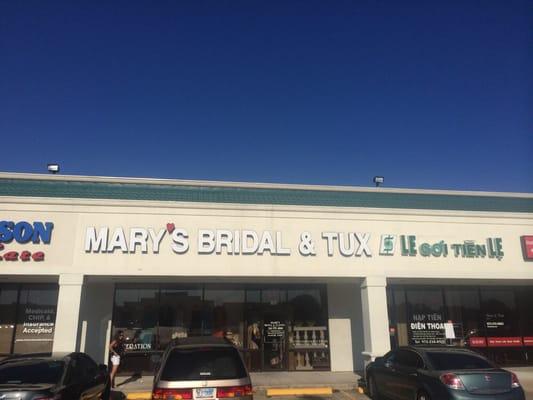 The front of Mary's bridal and tuxedo