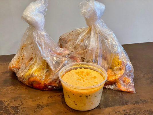 2x The Cajun Boil C
& Lobster Bisque