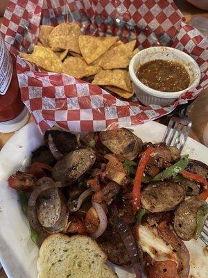 Sausage with peppers and the chips and salsa.