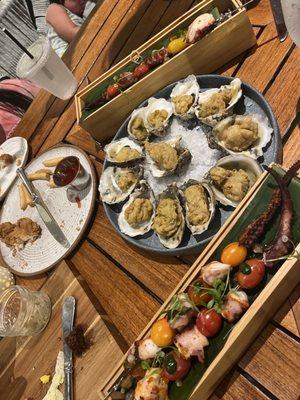 Octopus skewers and oysters