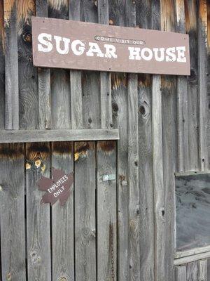 Wood-fired and sweet-smelling steam as the maple sap cooks down to syrup.