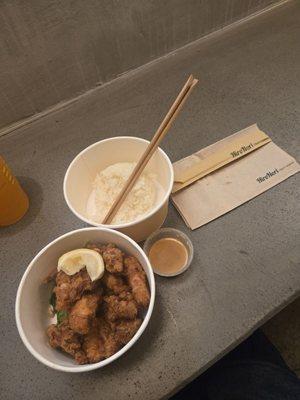 Crispy chicken with a scoop of rice