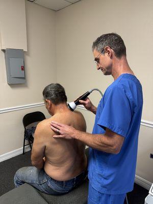 Focused shockwave therapy used to enhance soft tissue healing and repair for auto accident injuries.