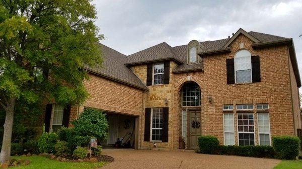New roof and new gutters make this house look brand new again!