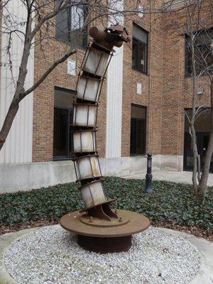an untitled sculpture (Scorpion's Tale) possibly by Mark Nicklasch can be found by the Fine Arts Building