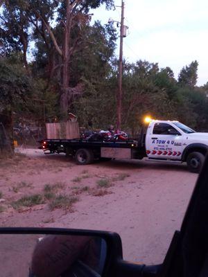 A-Tow 4 u delivering my Harley Davidson laying on it side after falling over while on tow truck!