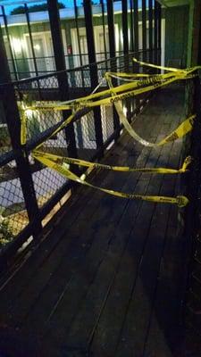 Second floor walkway too dangerous to walk on that has been like this for a week or two.