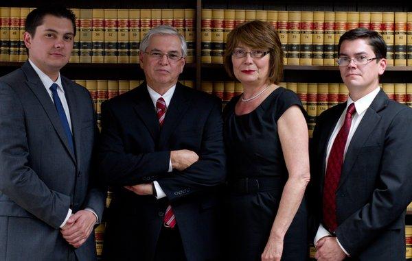 The whole family. We all work together and clients can pick their preferred attorney. Chris (left) is working elsewhere, but he'll be back