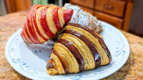 Strawberry croissant Nutella croissant and Pistachio croissant