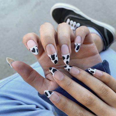 Gel manicure with nail art and Matt topcoat on natural nails. Almond shape