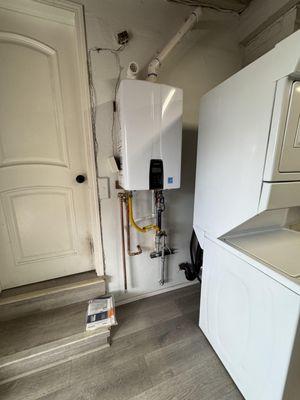 Tankless water heater with scale proof filter.