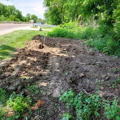 Uneven and no grass. 2 weeks later , still nothing but mud!