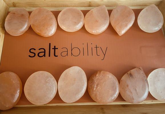 The heated Himalayan salt stones used during massage.