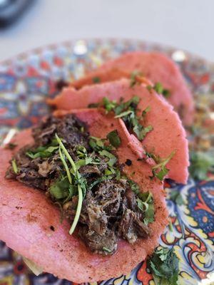 Cabeza taco showing. Other 2 were Birria on this plate