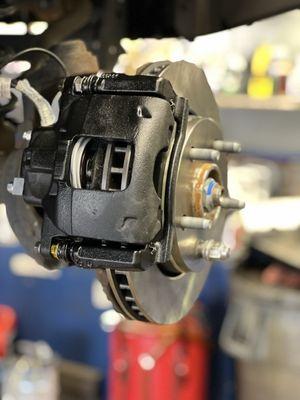Premium brake service with hydraulic calipers