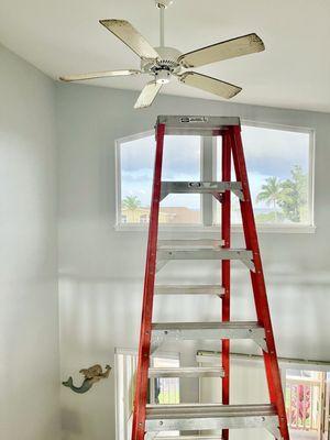 Replacing an old ceiling fan on the 20ft bolted ceiling