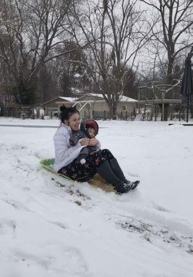 Sledding East side of the pool...flat farm land before the pool.