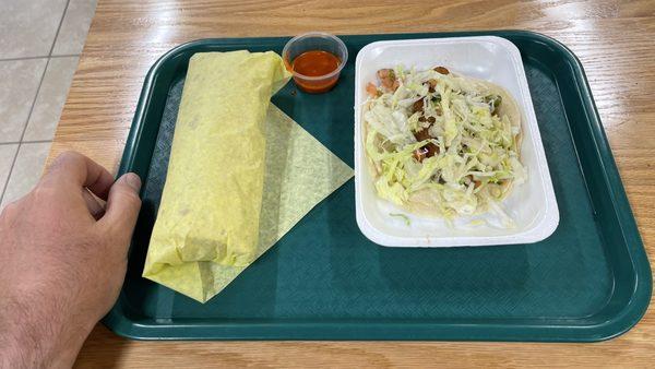 Shredded chicken burrito and fish taco (right side).