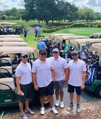 A few of our realtors out golfing!