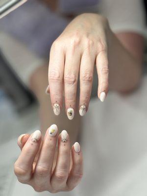 Dip nail manicure with hand painted accents by Annie