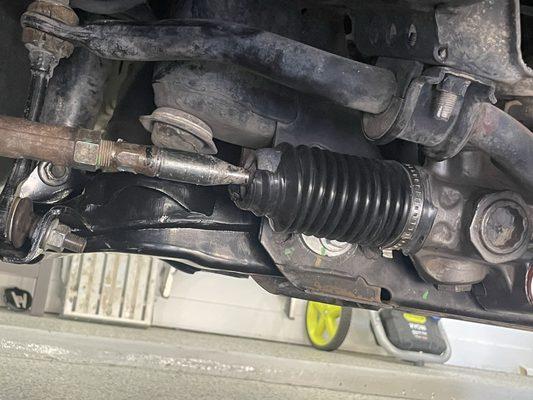 Torn Steering rack boot.