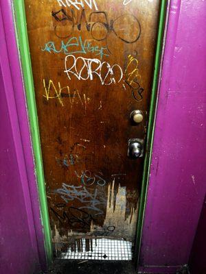 This is the door to the men's bathroom