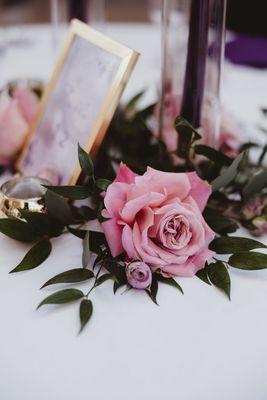 Loose blooms and greenery for reception tables