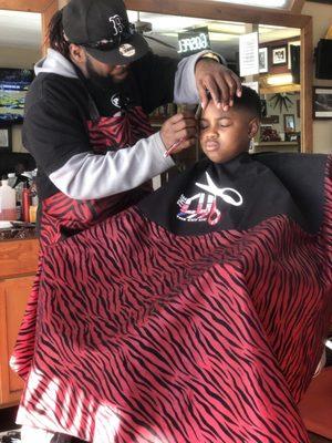 Cutting my sons hair , done by Q