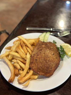 Schnitzel with French fries.